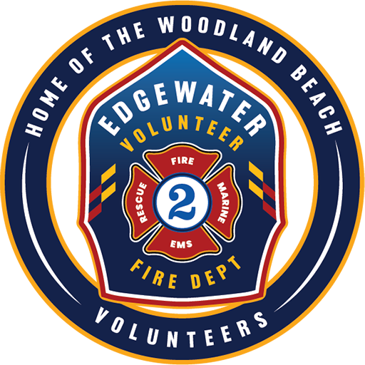 Logo of Edgewater Volunteer Fire Dept. Features a badge with "Rescue," "Fire," "EMS," "Marine," and number 2. Text around reads "Home of the Woodland Beach Volunteers" on an orange background.