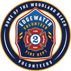 Logo of Edgewater Volunteer Fire Department. In the center, a badge with the number 2 and words "Rescue," "EMS," "Fire," and "Marine." Around it, the text reads "Home of the Woodland Beach Volunteers.